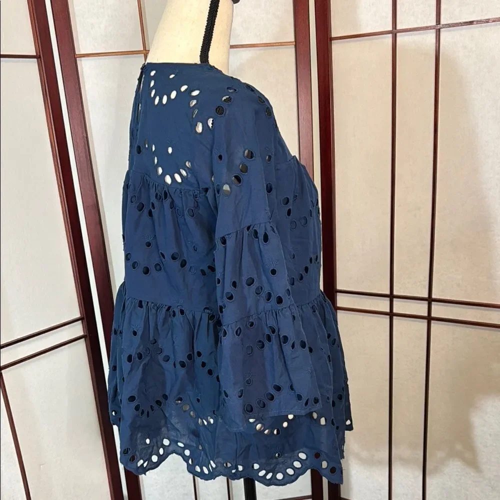 Chic Blue Blouse with Elegant Detailing